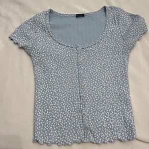 Brandy Melville cropped, button up blouse with a floral.